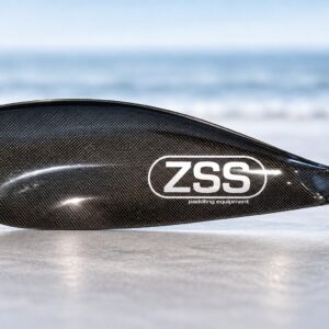 ZSS Genesis Evo paddle blade on a coastal background