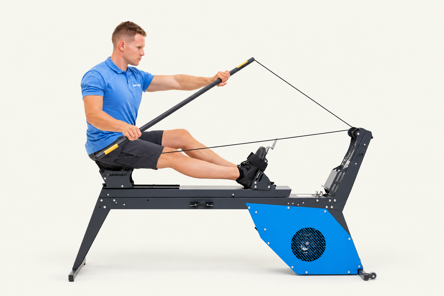 KayakFirst kayak ergometer with KayakFirst logo, shown in use against a clean studio background