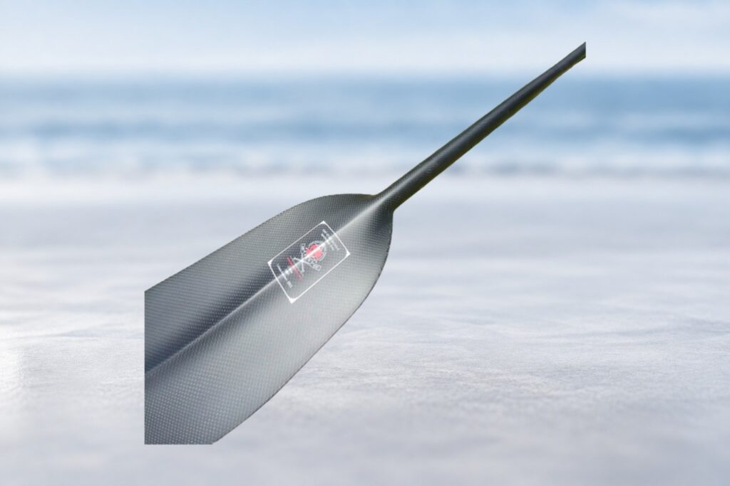 ZSS Dragon Boat blade face detail on coastal background